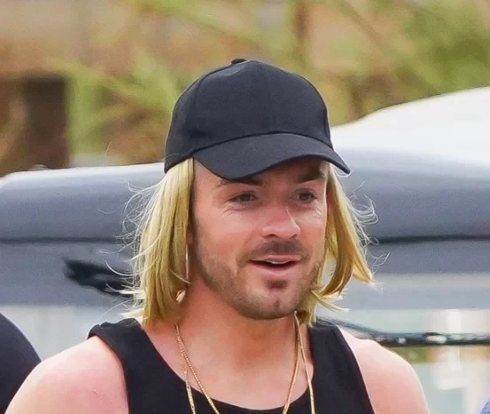 Is he channeling Haaland? Grealish goes on holiday in France with a blonde wig