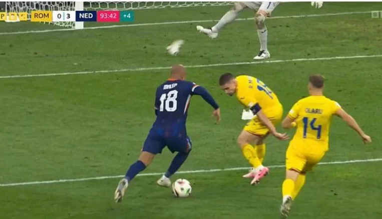 Weird! Romanian fans throw shoes into the penalty area to obstruct their opponents and prevent further goals