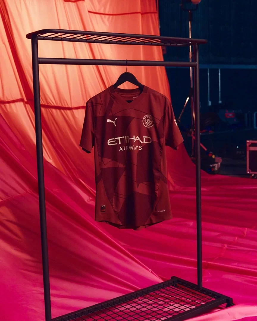 Manchester City unveils its second away kit: Burgundy with gold accents