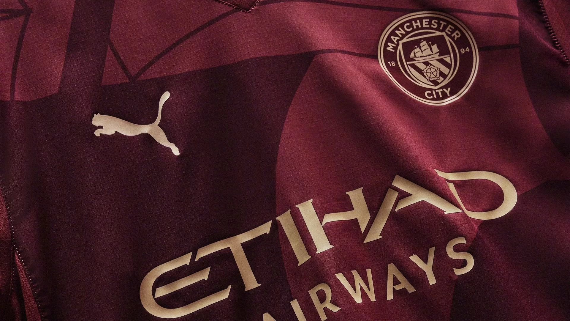 Manchester City unveils its second away kit: Burgundy with gold accents