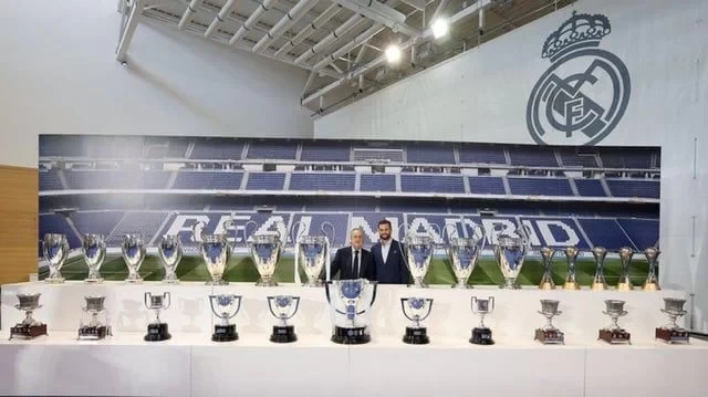 A fond farewell! Nacho poses with his trophies as he bids farewell to Real Madrid